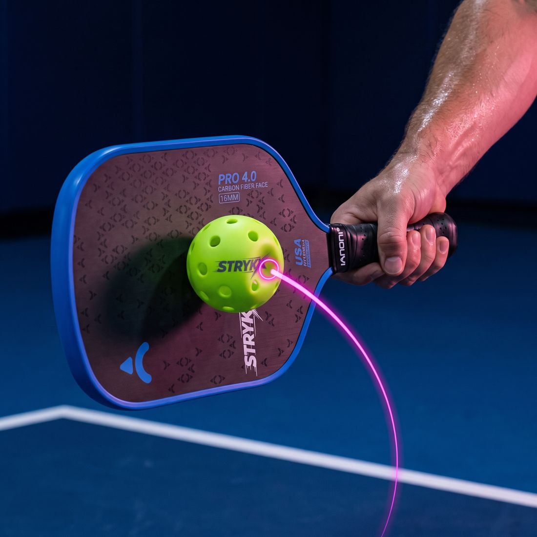 Close-up of a player's paddle angle just before contact
