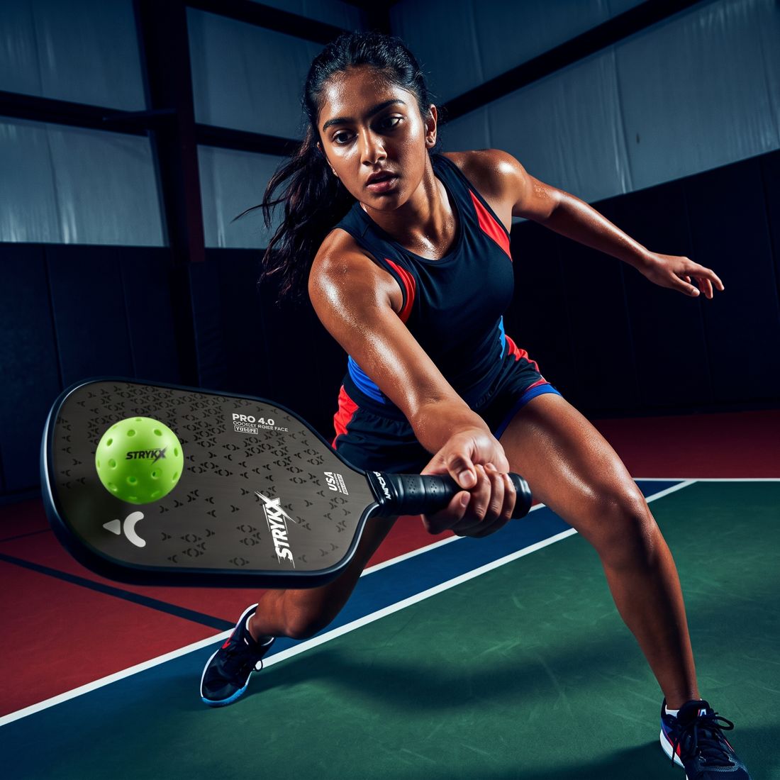 Doubles pickleball players before a serve using a stacking position