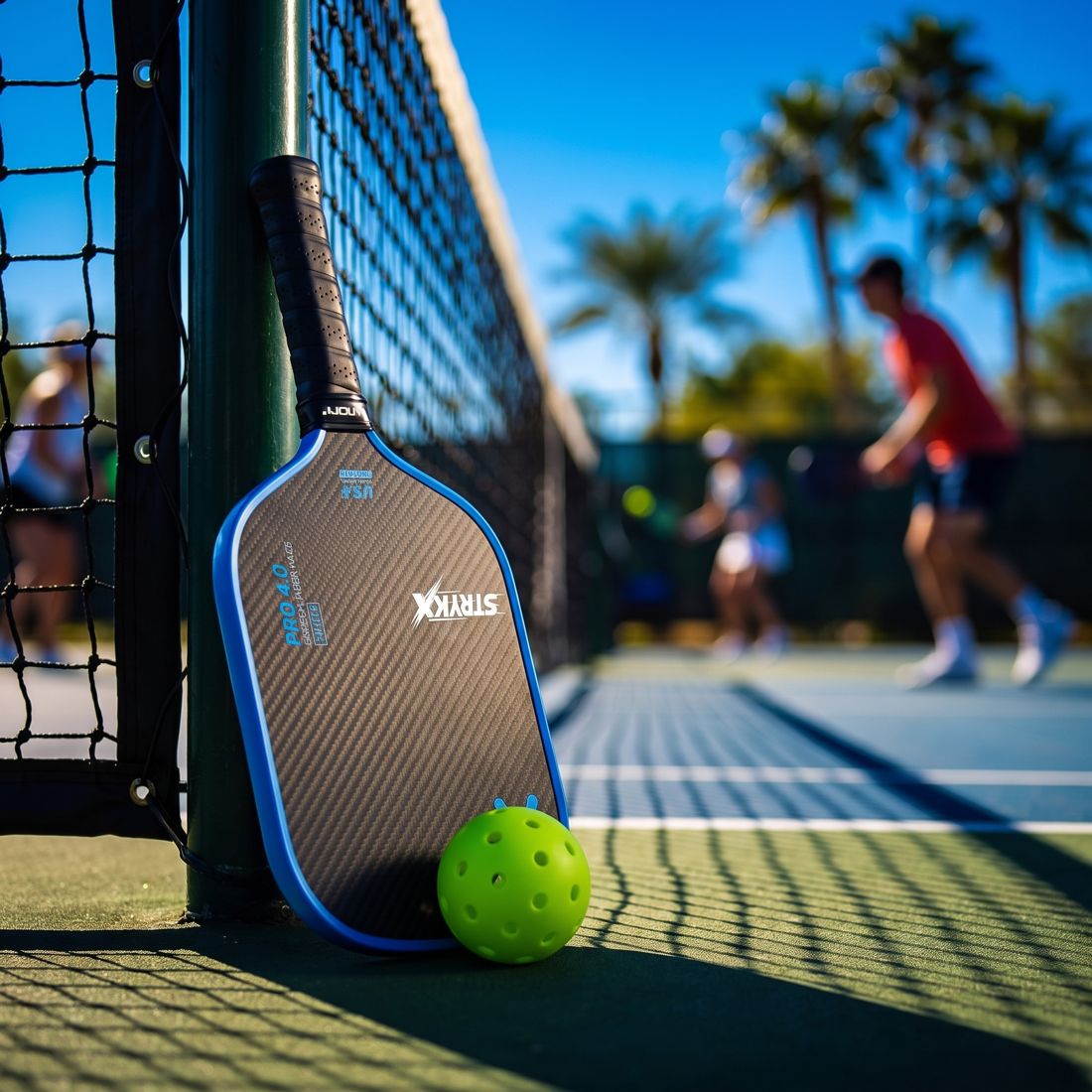 Comparison of light and heavy pickleball paddles side by side