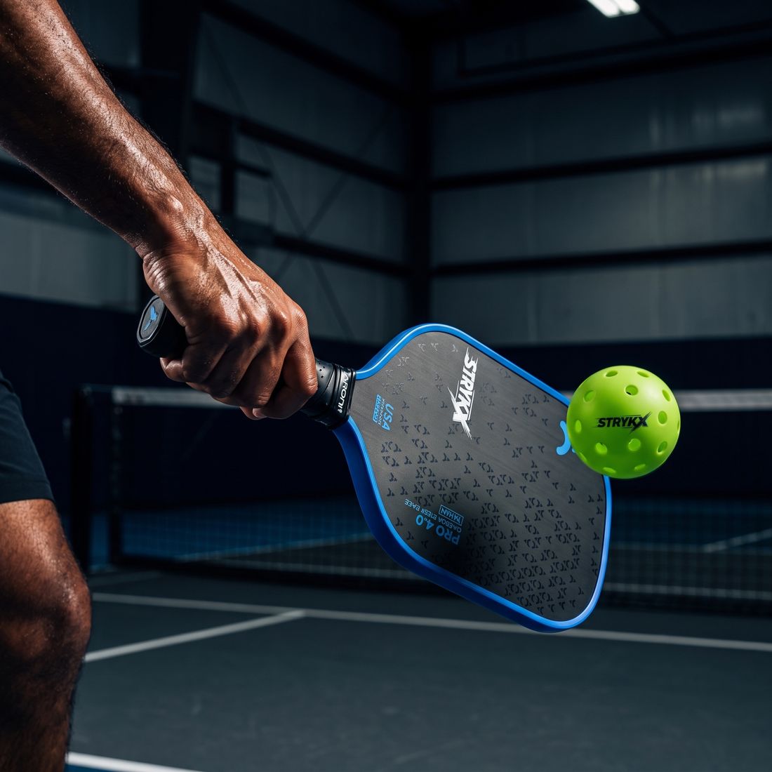 Player blocking a hard-hit ball with a stable paddle position