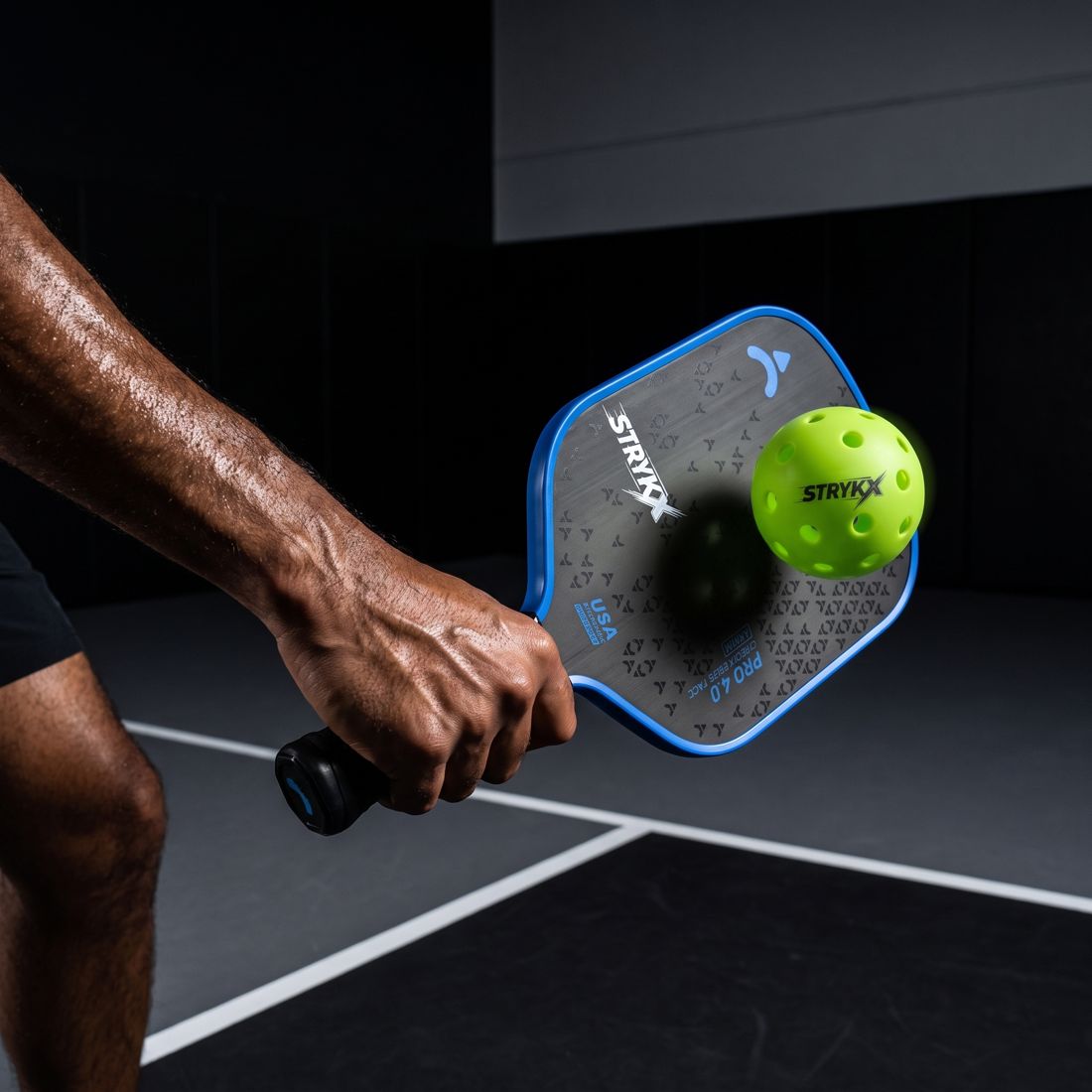 Player performing a split step at the kitchen line